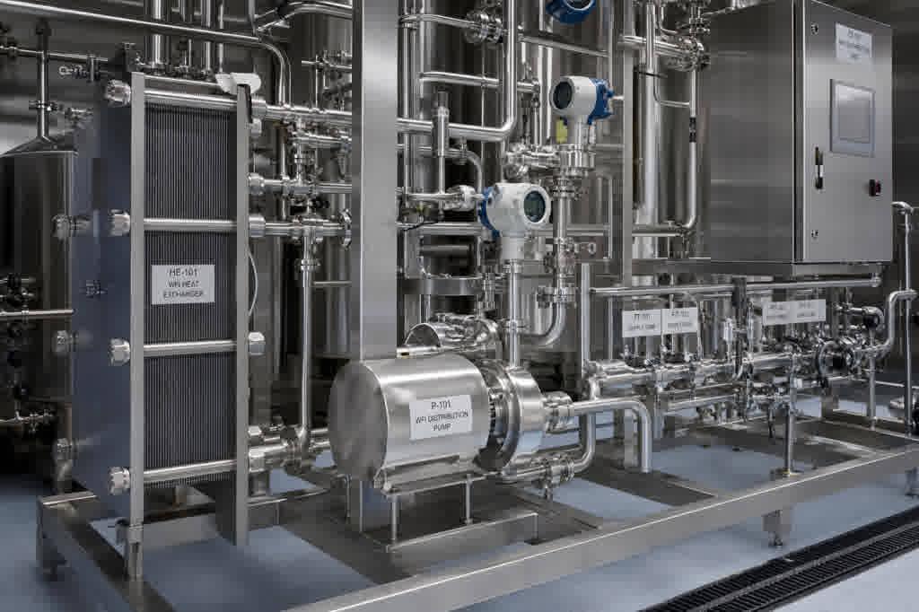 Pharmaceutical WFI distribution skid with sanitary stainless piping